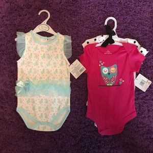 2 sets of brand new one pieces. 3 total.